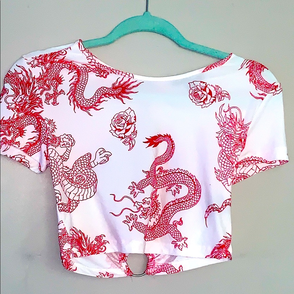 Women’s red dragon too it’s back cutout, size medium.